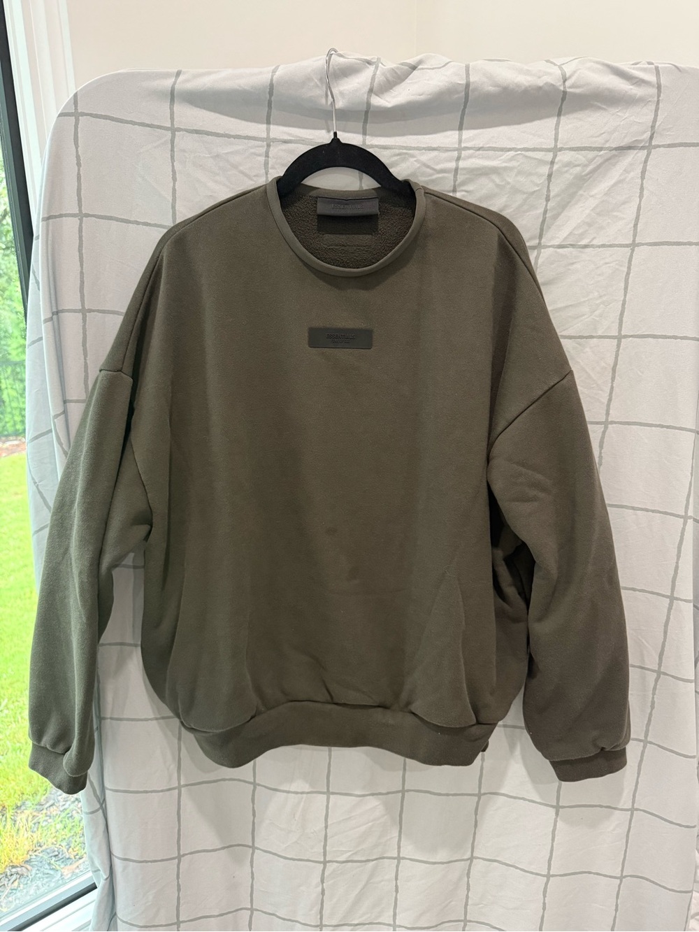 Essentials Unisex Olive Crewneck Sweatshirt and sweatpants.